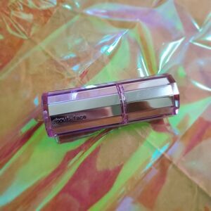 About Face. LIGHT LOCK HIGHLIGHT FLUID. SUNSTRUCK.